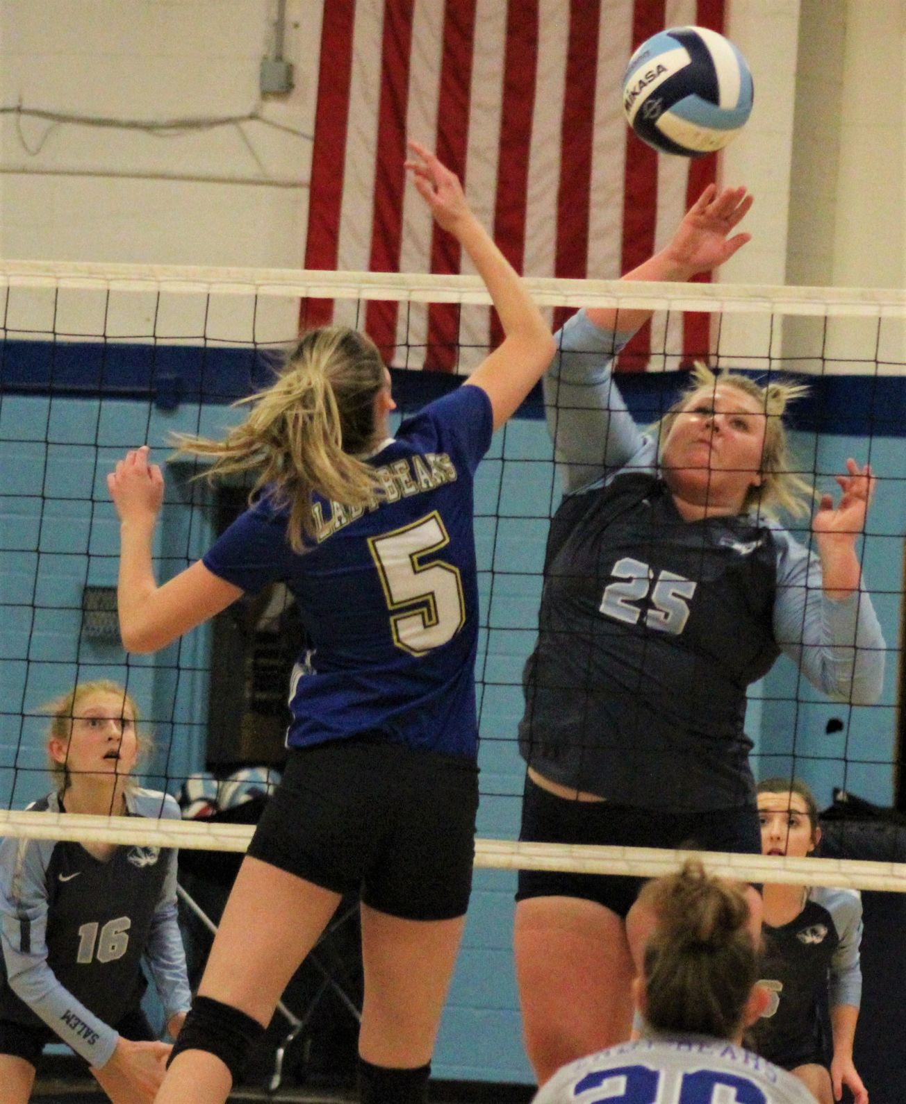 Ashton Mink battles for the ball